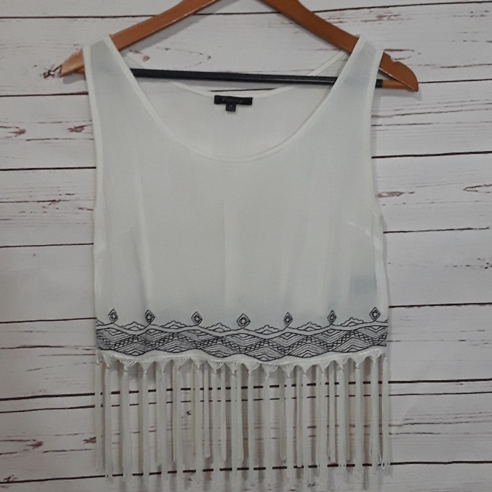 Crop tank top with tassle bottom. Size small